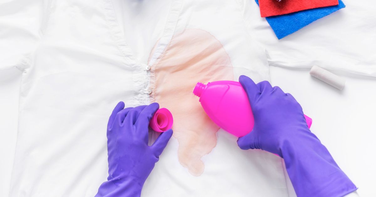 Liquid to remove stains on clothes close up